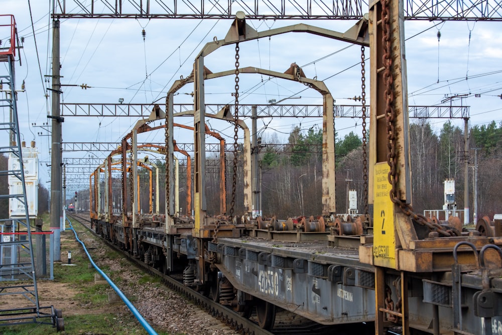 an old train car sitting on the tracks