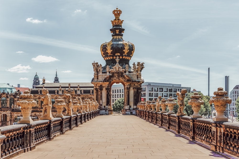 a bridge that has statues on the sides of it