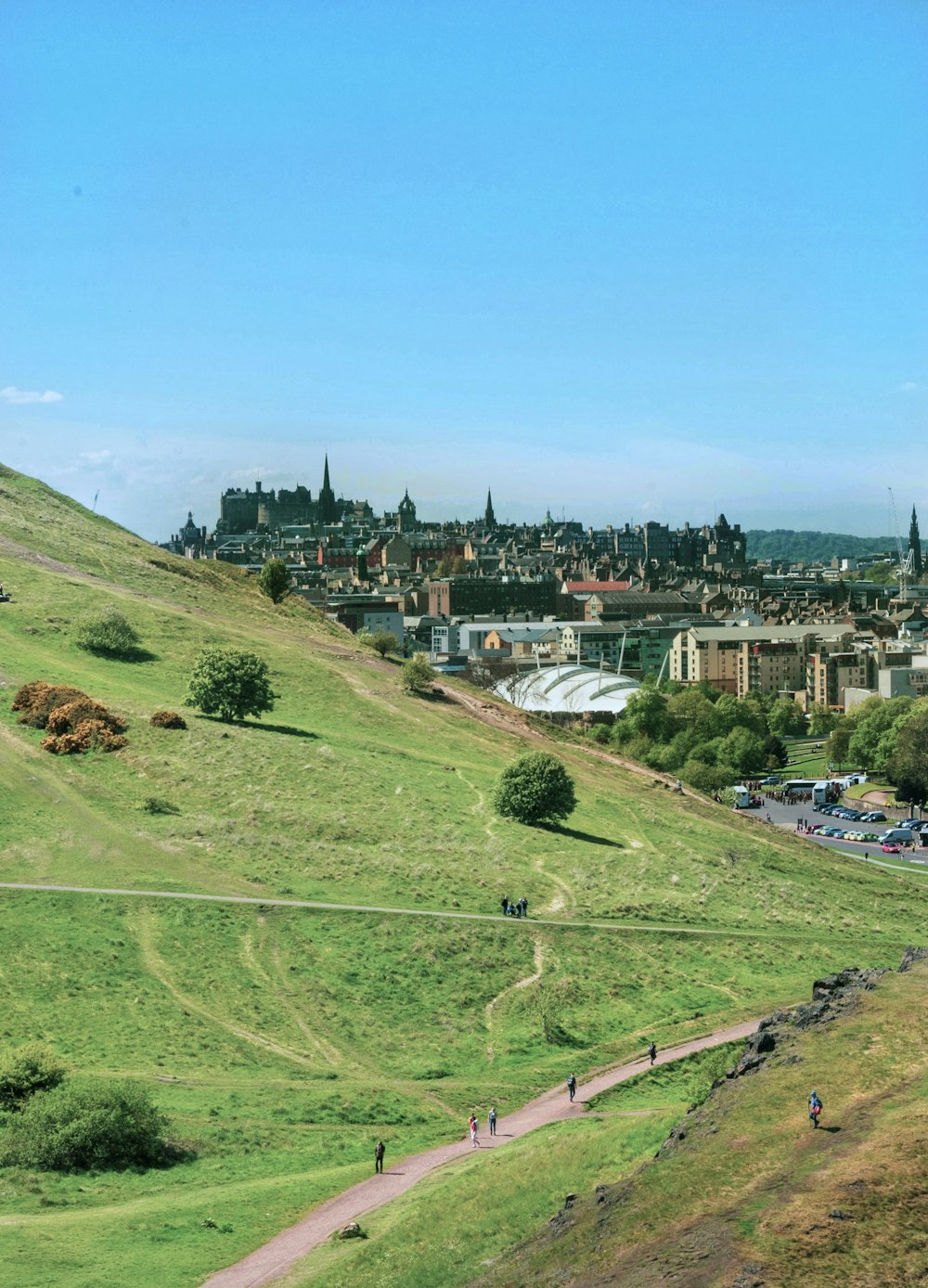 a view of a city from a hill