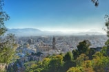 a view of a city with mountains in the background