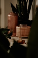 A serene setting featuring Attariya perfumes surrounded by natural elements.