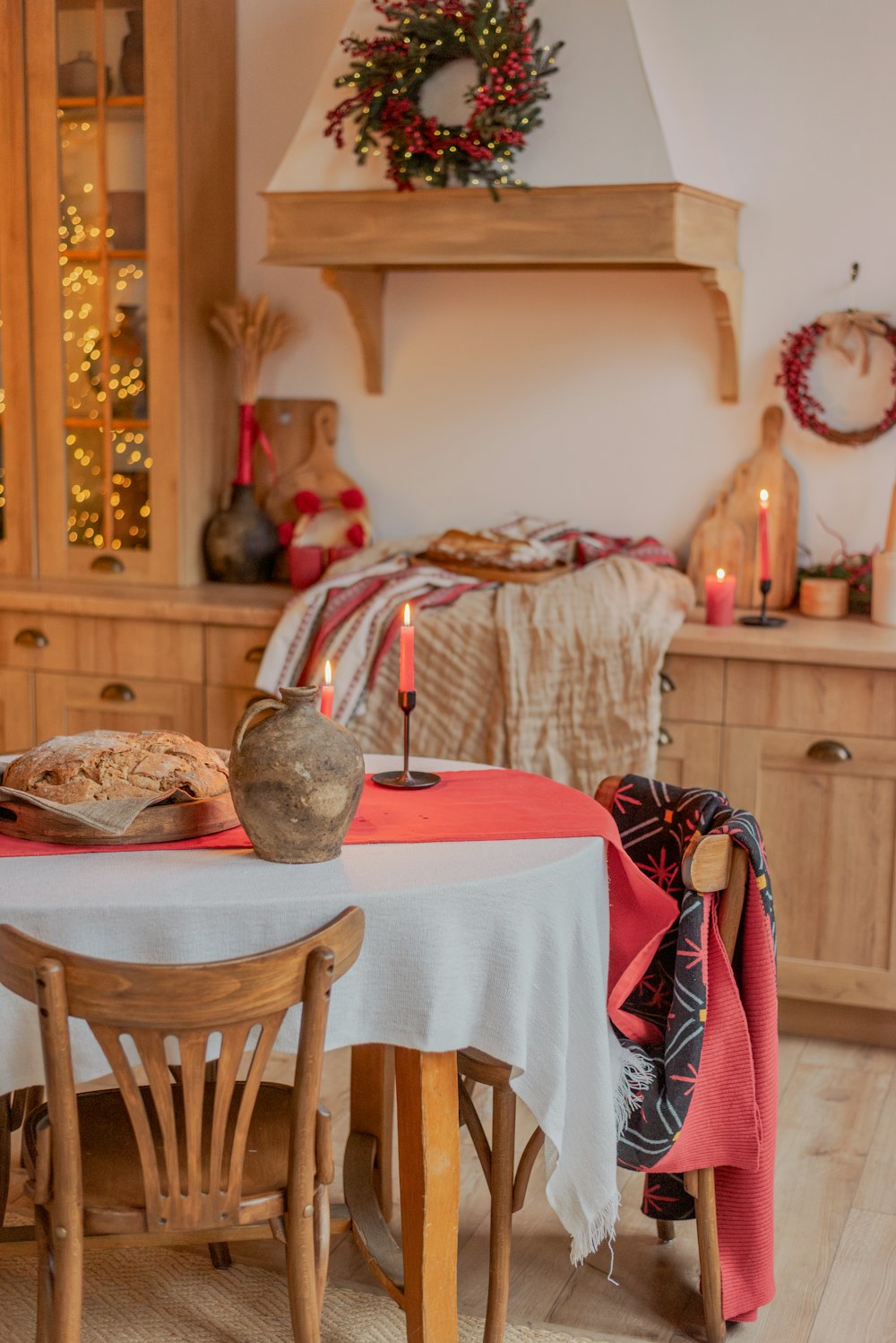 a dining room table with a candle on it