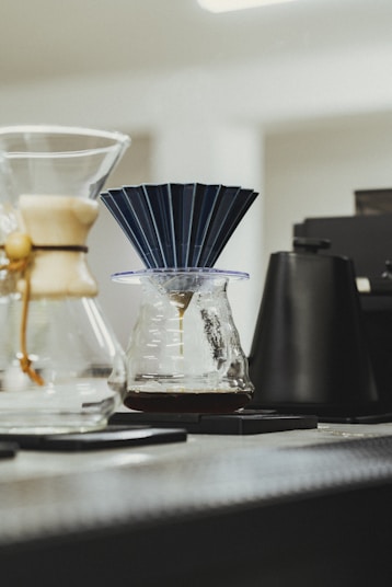 a table topped with different types of coffee filters