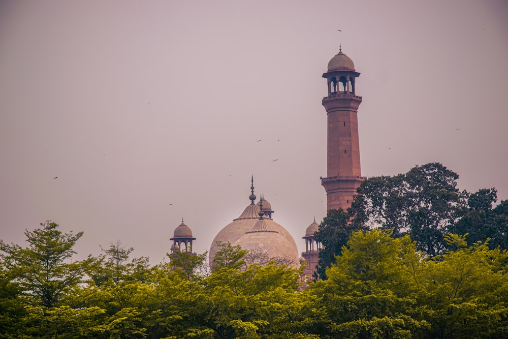 a tall tower with a clock on top of it