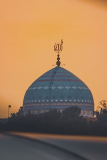 a large dome with a clock on top of it