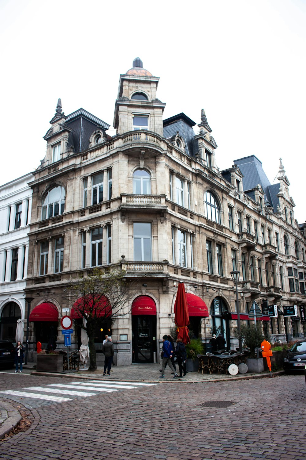 a group of people standing in front of a building