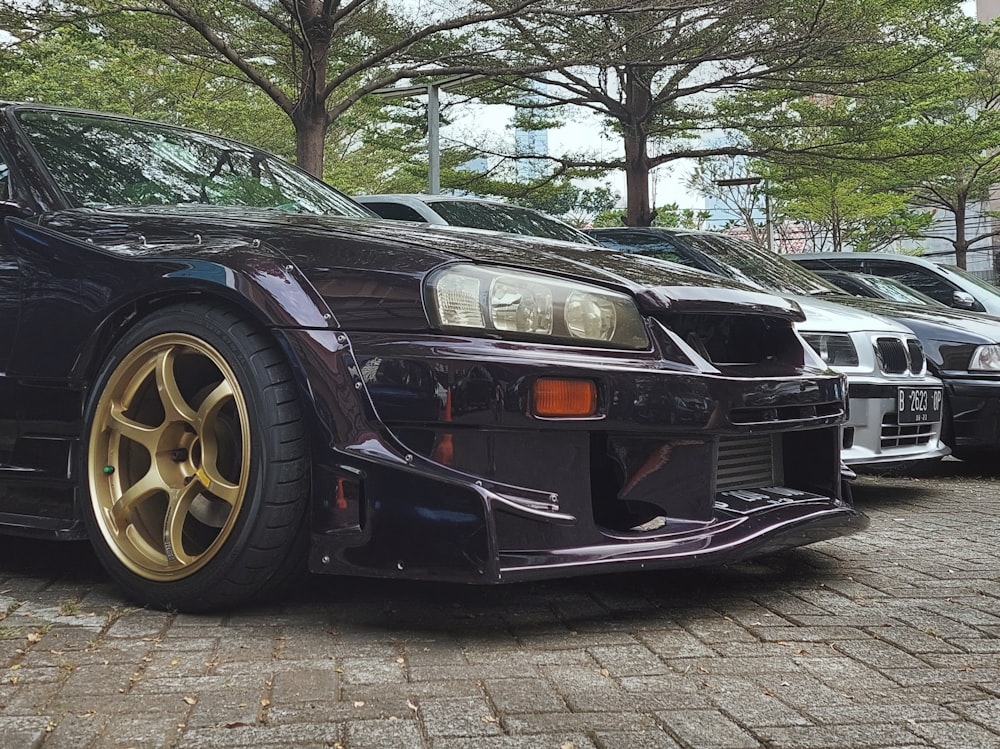 a group of cars parked next to each other