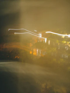 An abstract blurred image hinting at creativity and innovation behind the scenes.