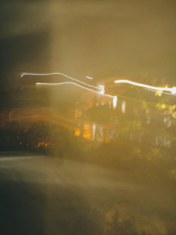 An abstract blurred image hinting at creativity and innovation behind the scenes.