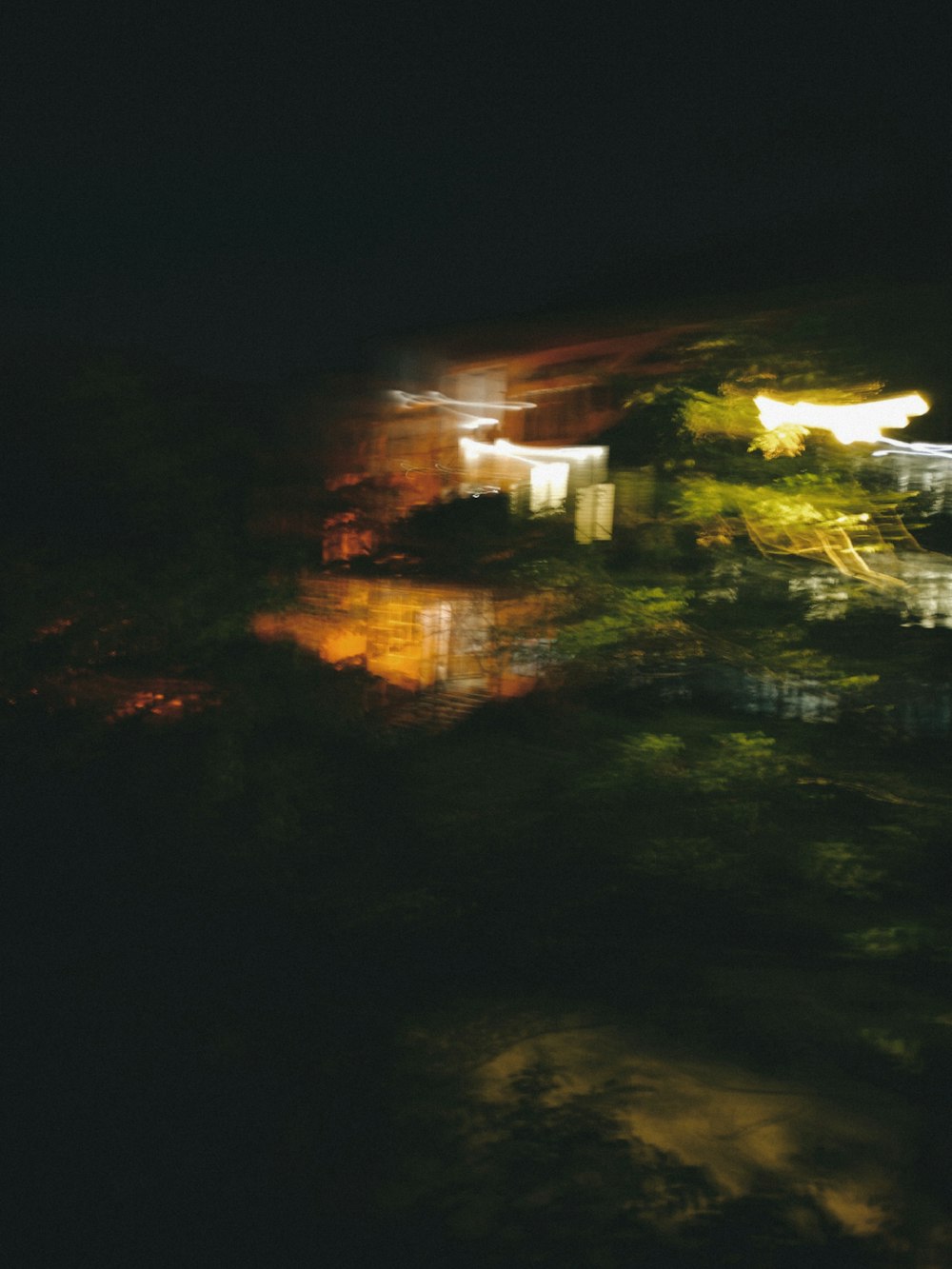 a blurry photo of a city at night