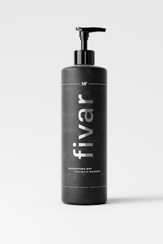 A sleek black bottle with a pump dispenser on top, prominently displaying the text 'fivar' in white lettering. The bottle is set against a light, neutral background, creating a minimalistic and modern appearance. The label also includes smaller text mentioning 'mockupfree.net' and 'realistic-mockups'.