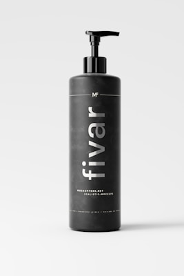 A sleek black bottle with a pump dispenser on top, prominently displaying the text 'fivar' in white lettering. The bottle is set against a light, neutral background, creating a minimalistic and modern appearance. The label also includes smaller text mentioning 'mockupfree.net' and 'realistic-mockups'.