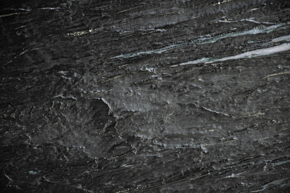 a close up of a black marble surface