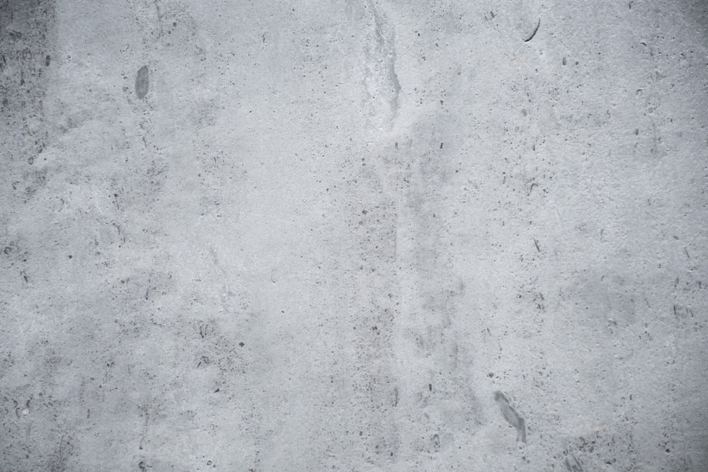 a black and white photo of a concrete wall