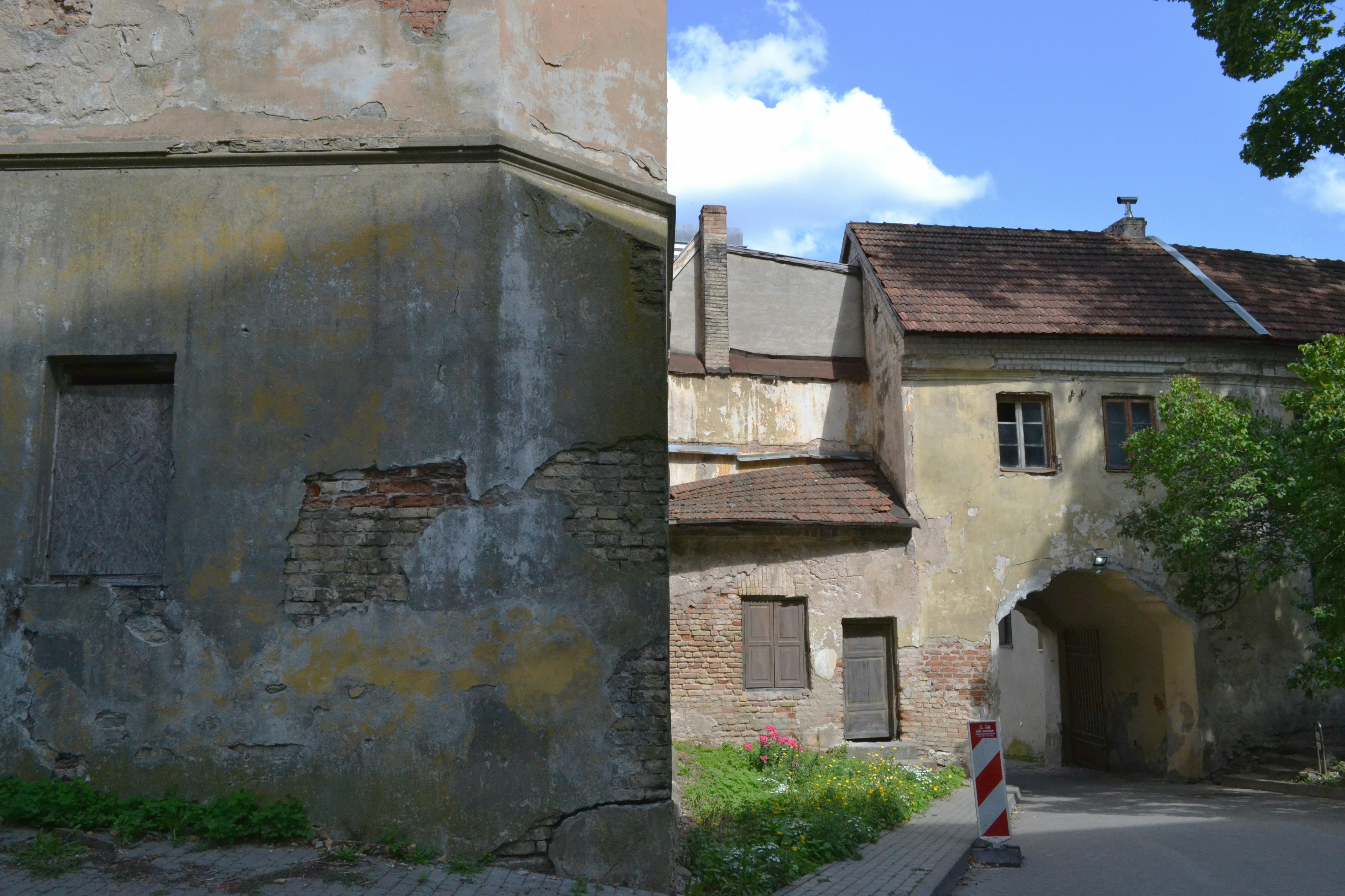 an old building next to a newer building
