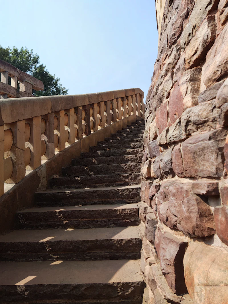 close view of a staircase in a monument going up in a circular fashion