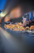 A cinematic frame showing a dramatic urban night scene with vibrant lighting.