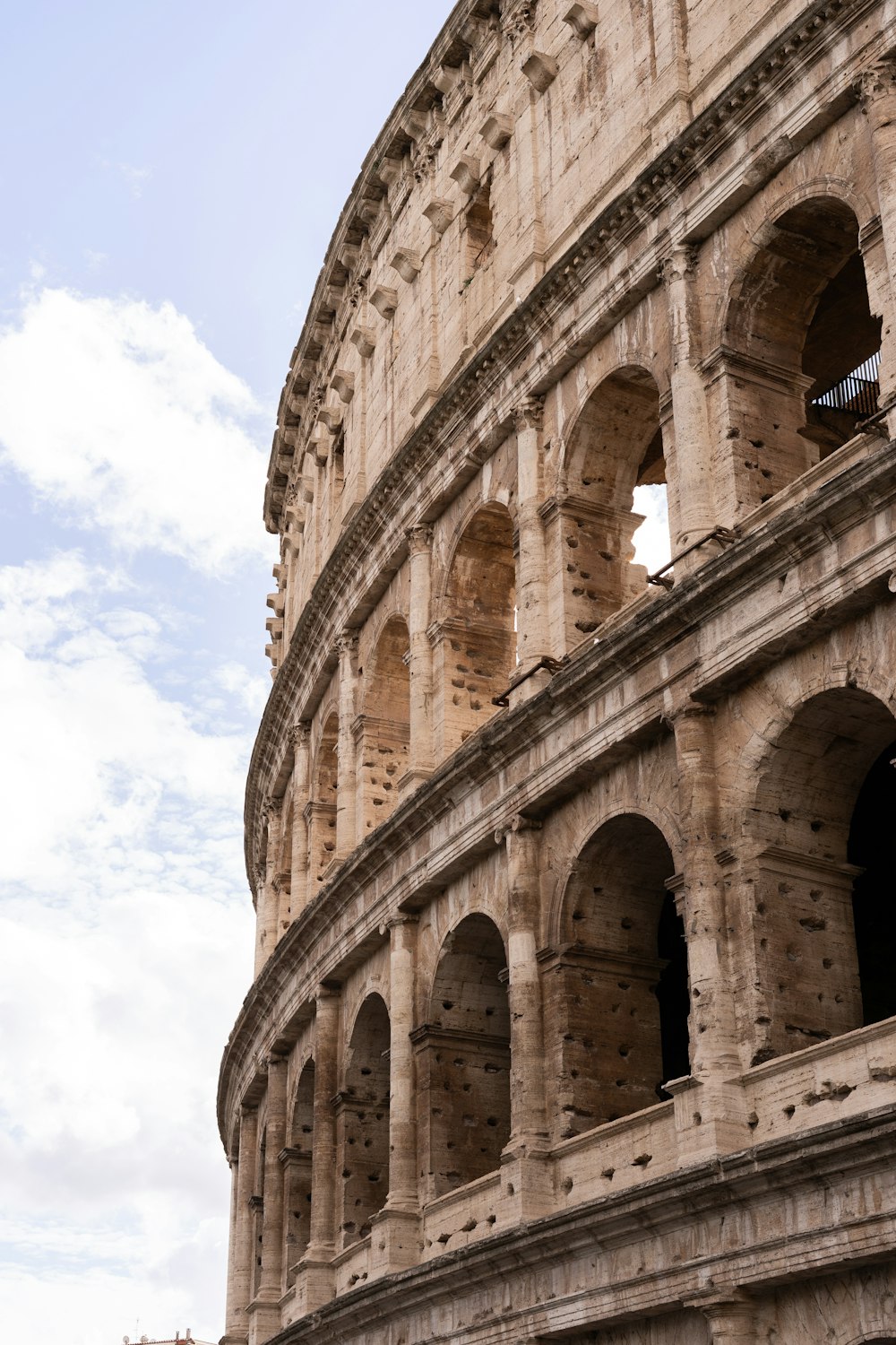 a close up of the side of an ancient building