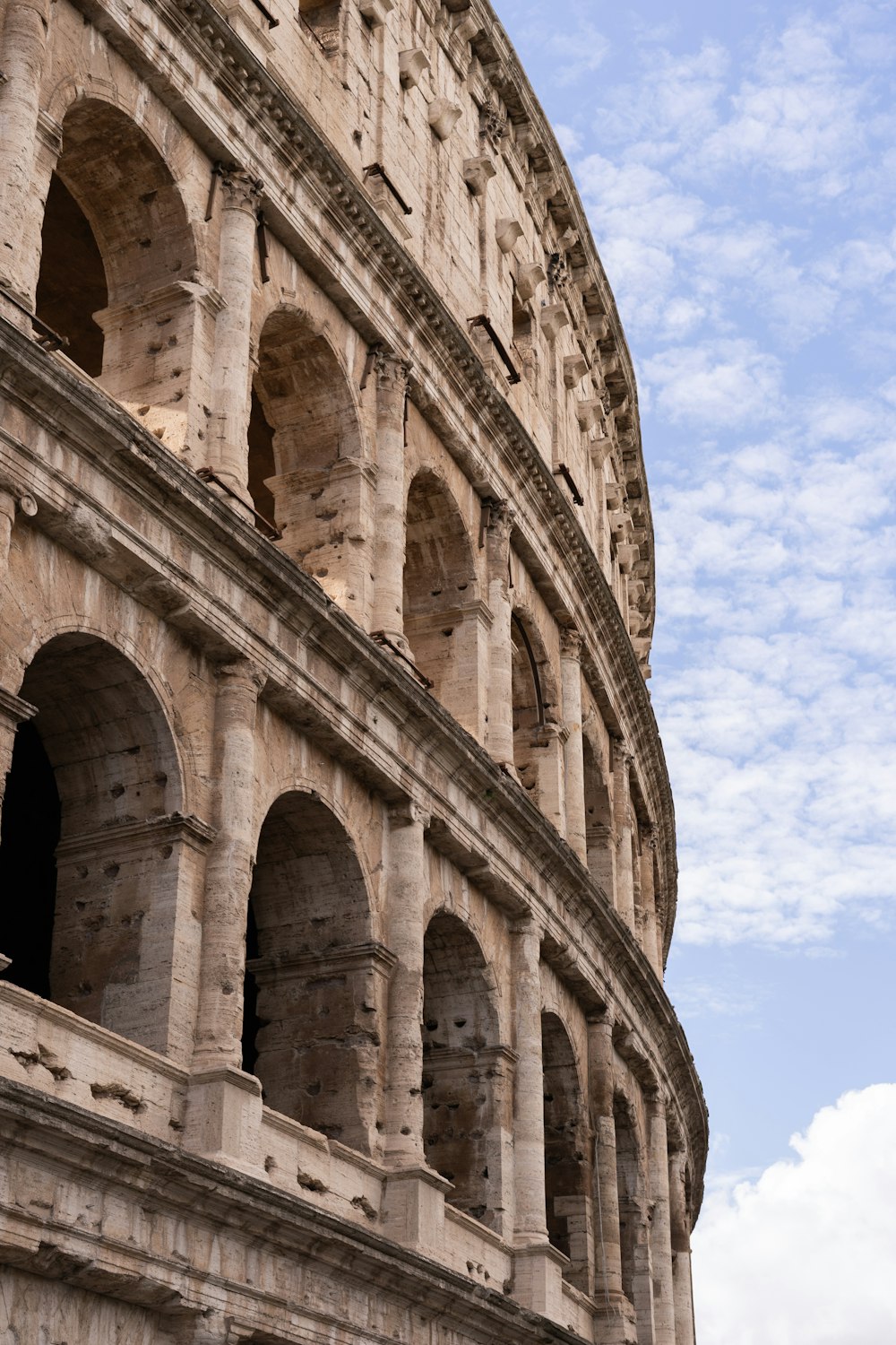 a close up of the side of an ancient building