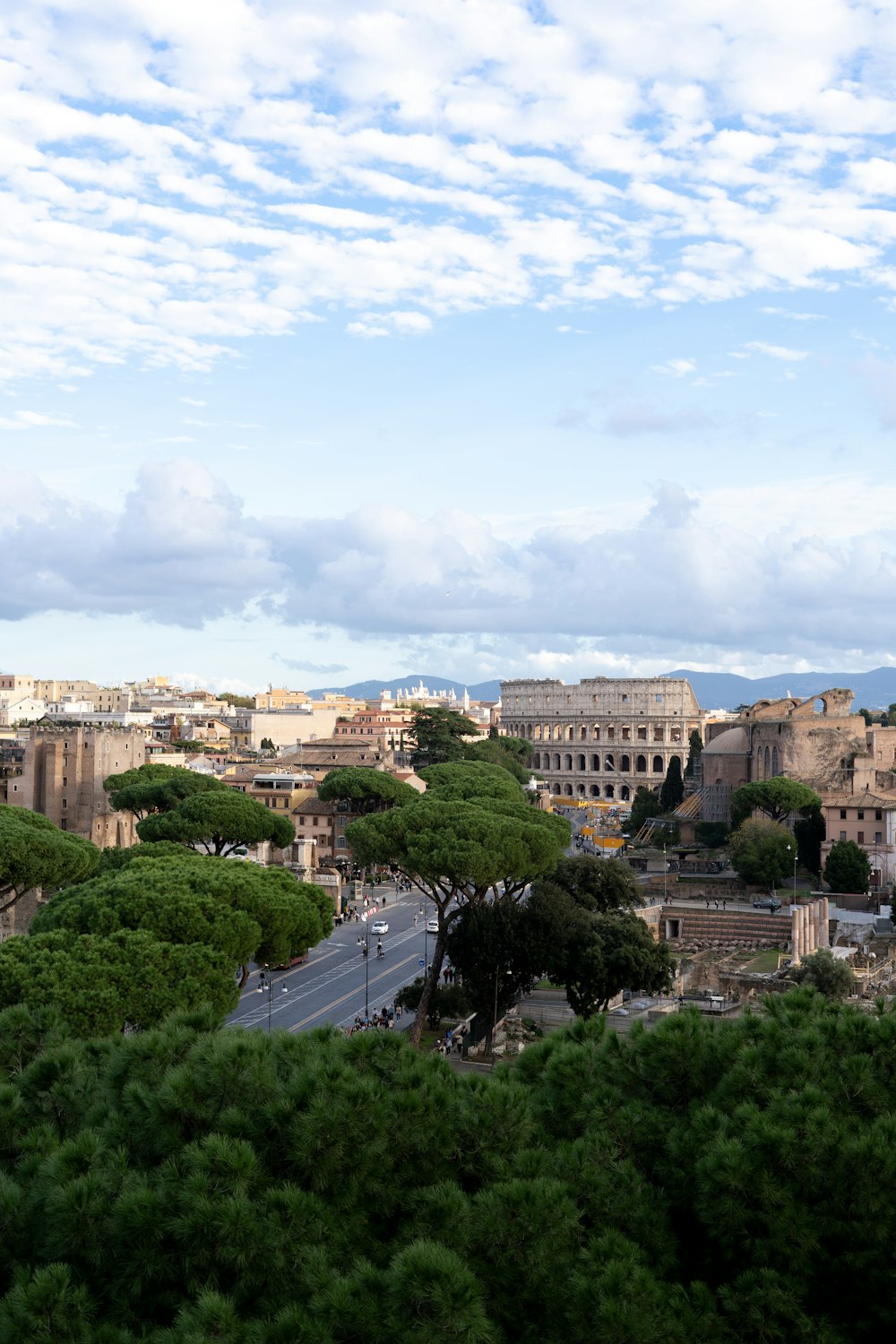 a view of a city from a hill