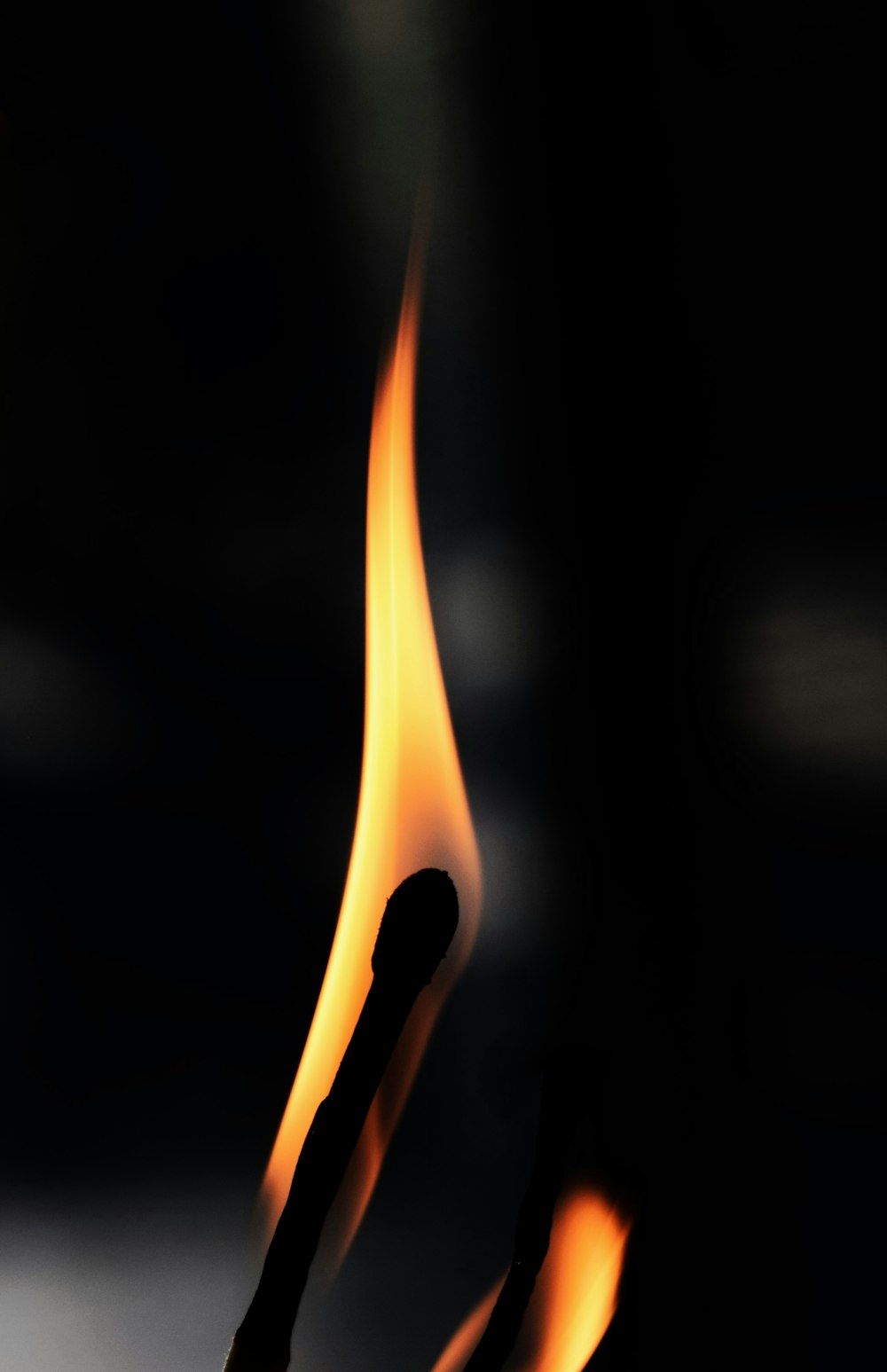 a close up of a fire with a black background