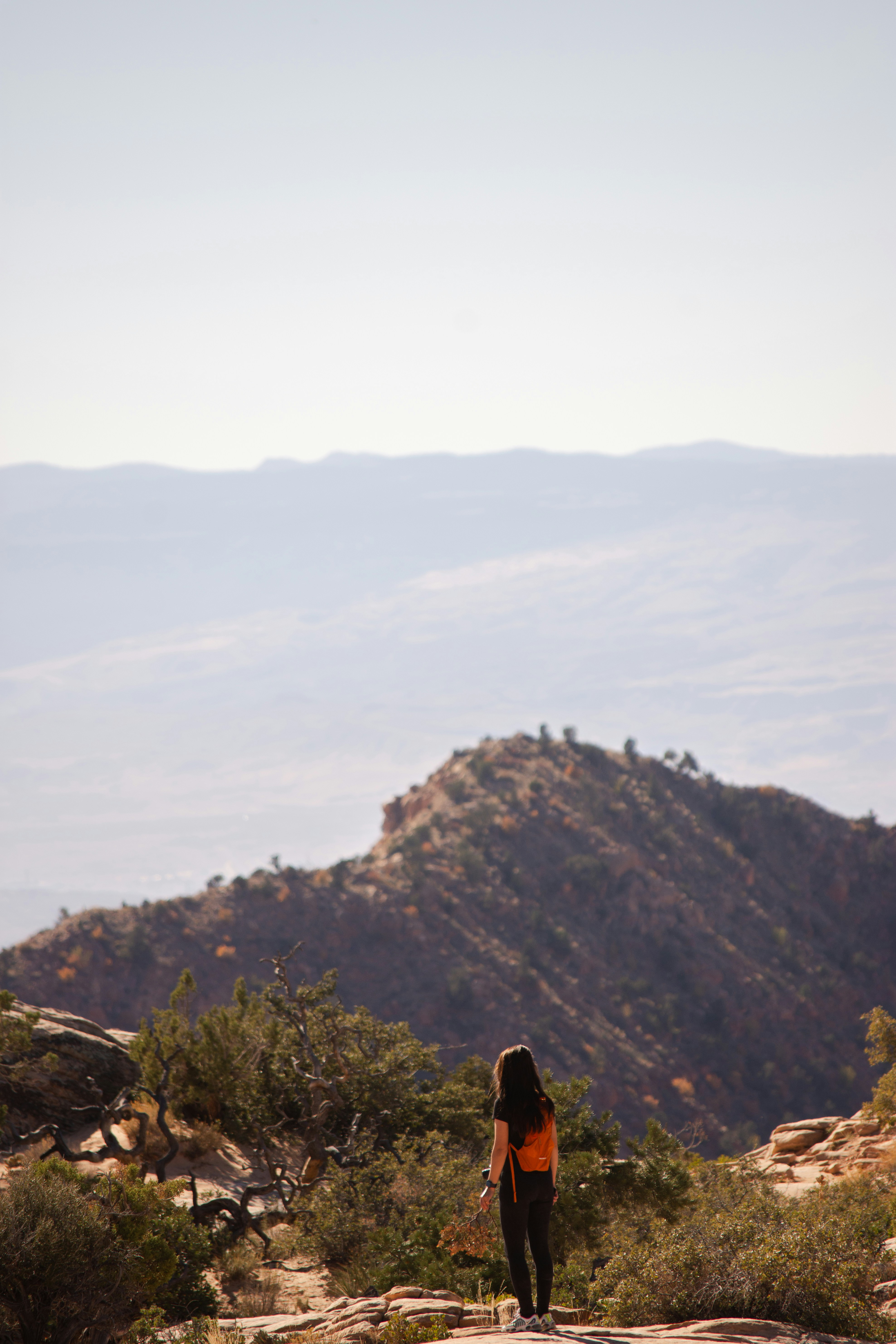 a person standing on top of a mountain
