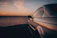 A sleek 2018 Ford Focus parked by the Tampa waterfront at sunset.