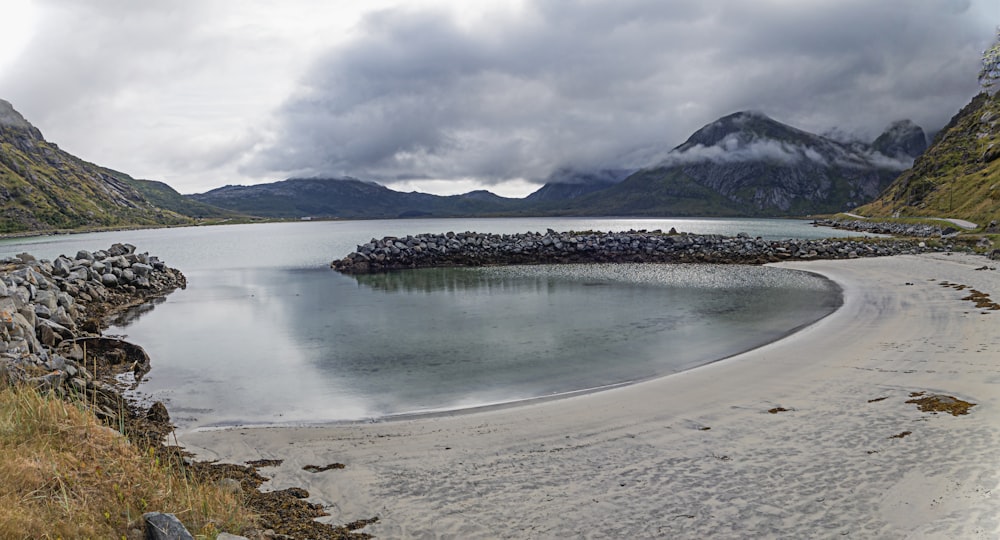 a large body of water surrounded by mountains