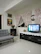 A cozy living room featuring Tymes blackout curtains.