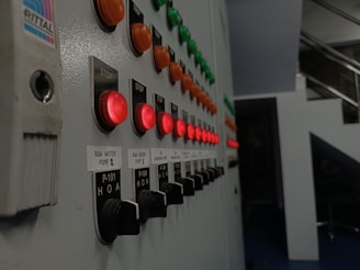 Close-up of diesel engine controllers and jockey pump controllers in a control panel setup.