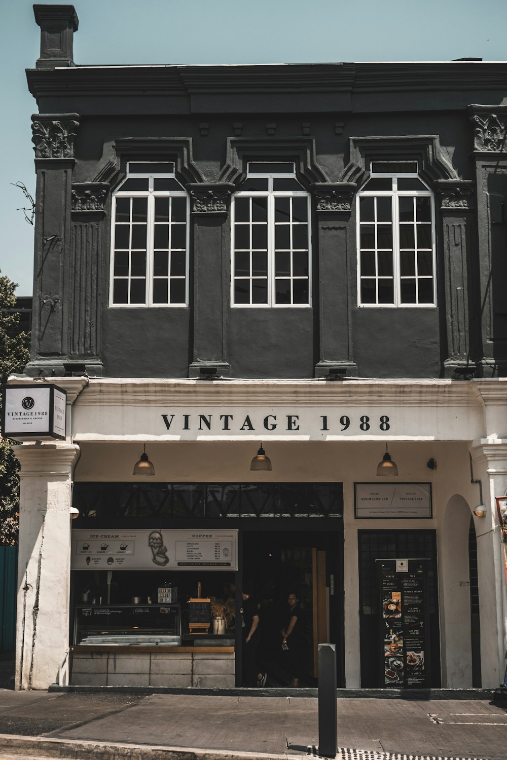 a black and white photo of a store front