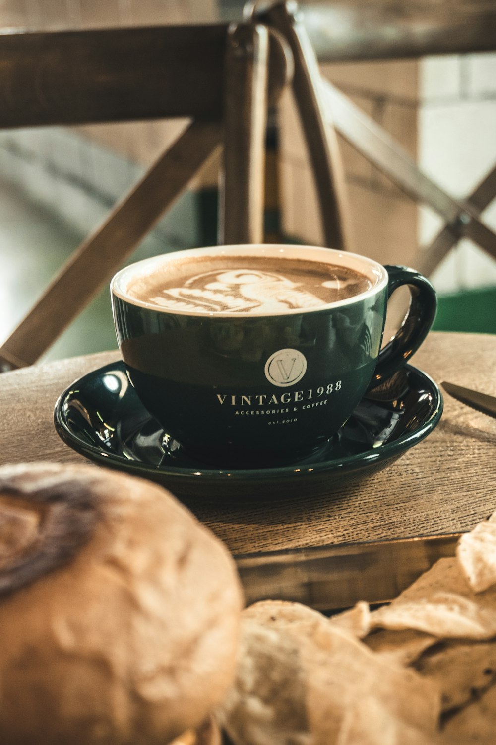 a cup of coffee sitting on top of a saucer