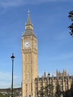 a tall clock tower towering over a city