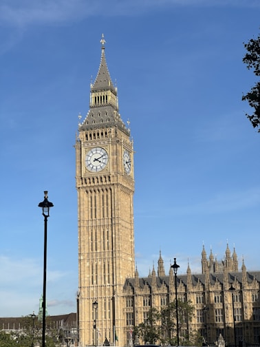 a tall clock tower towering over a city