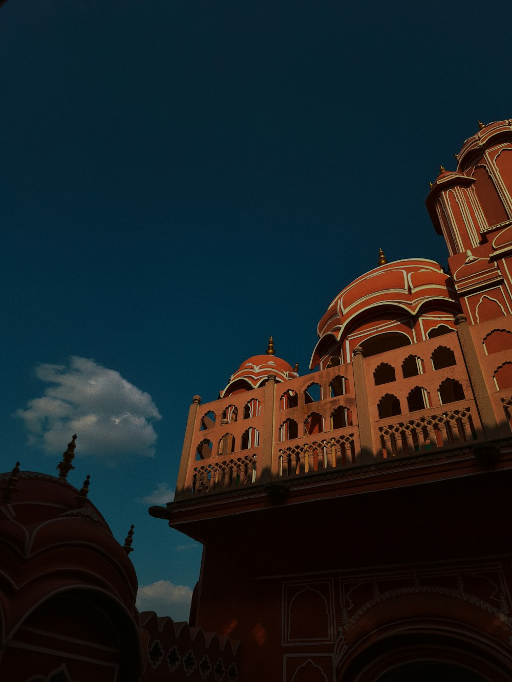 a large building with a clock on it's side