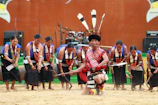 a group of people dressed in traditional clothing