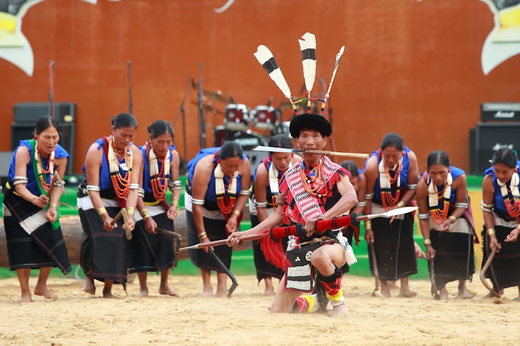 Dancers in traditional attire perform the vibrant and energetic Naga tribal dance with drums
