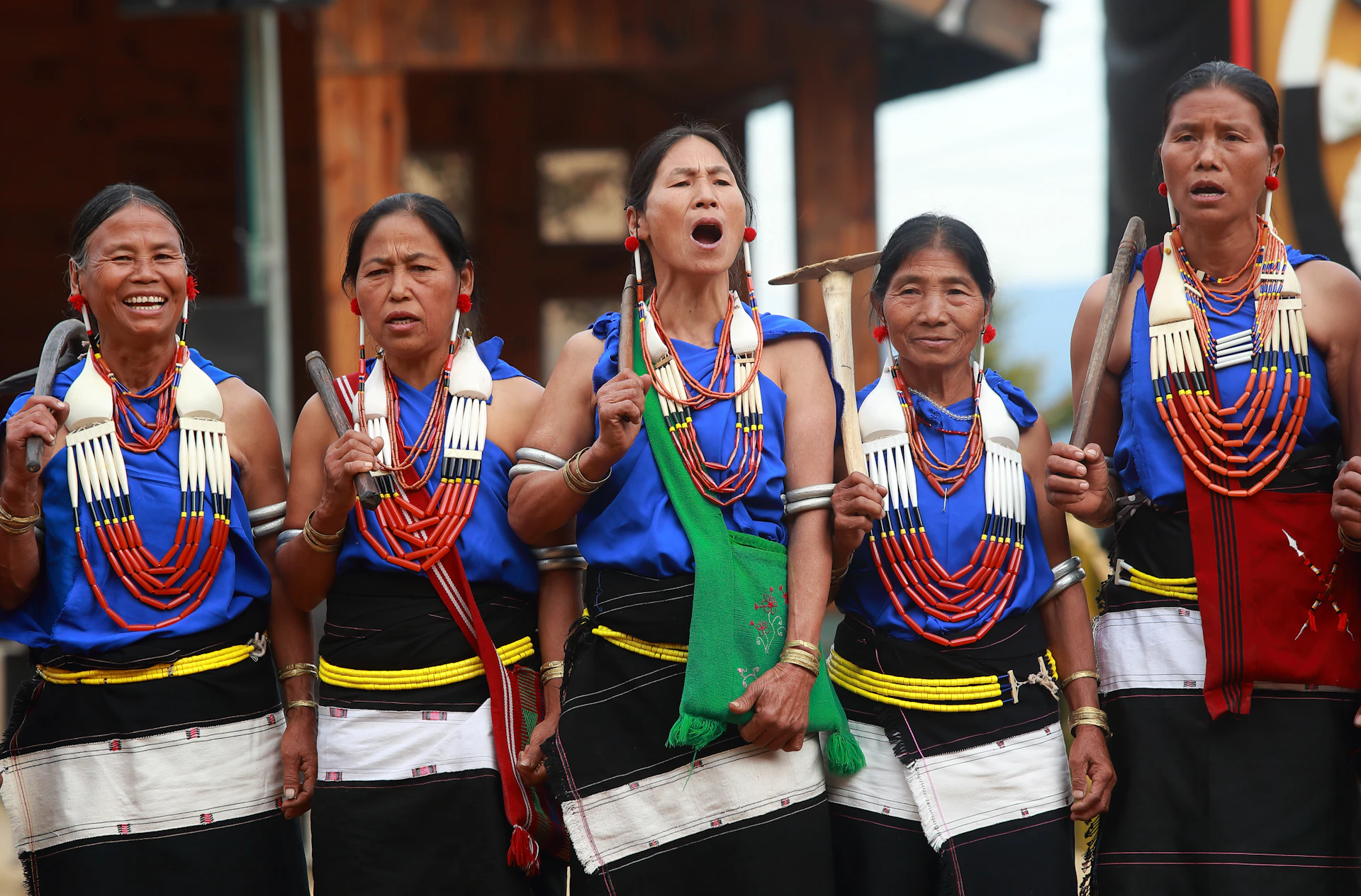 a group of women standing next to each other