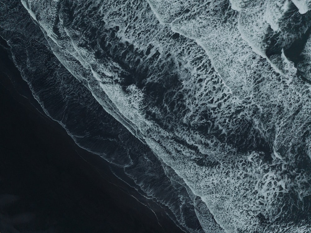 a black and white photo of the ocean