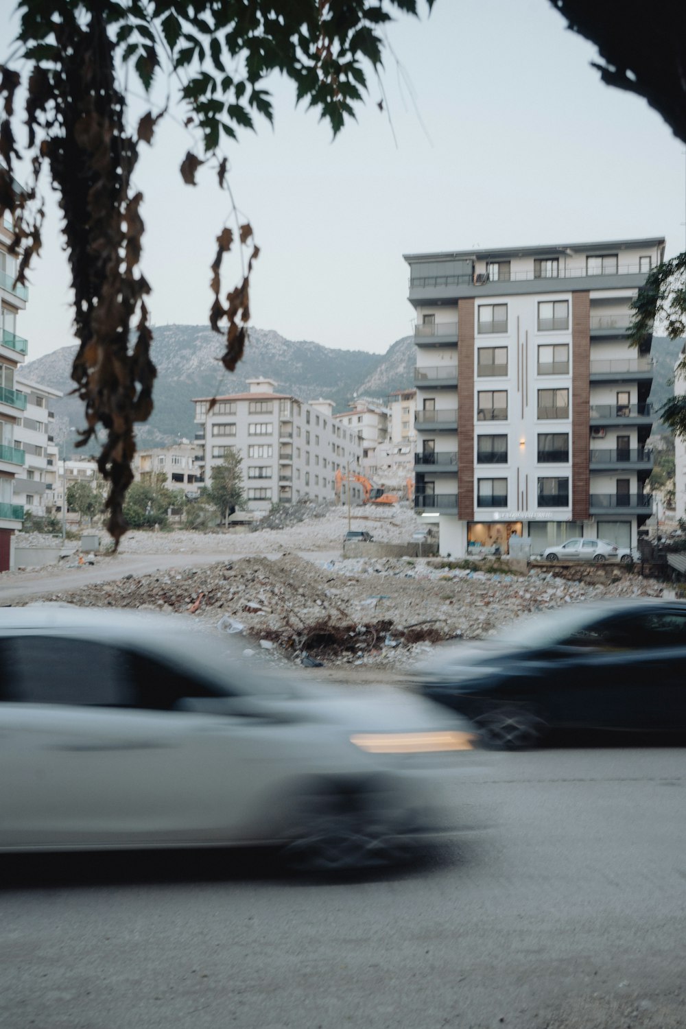 a blurry photo of cars driving down a street