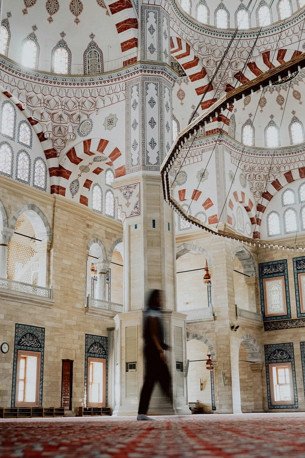 a person is walking in a large building