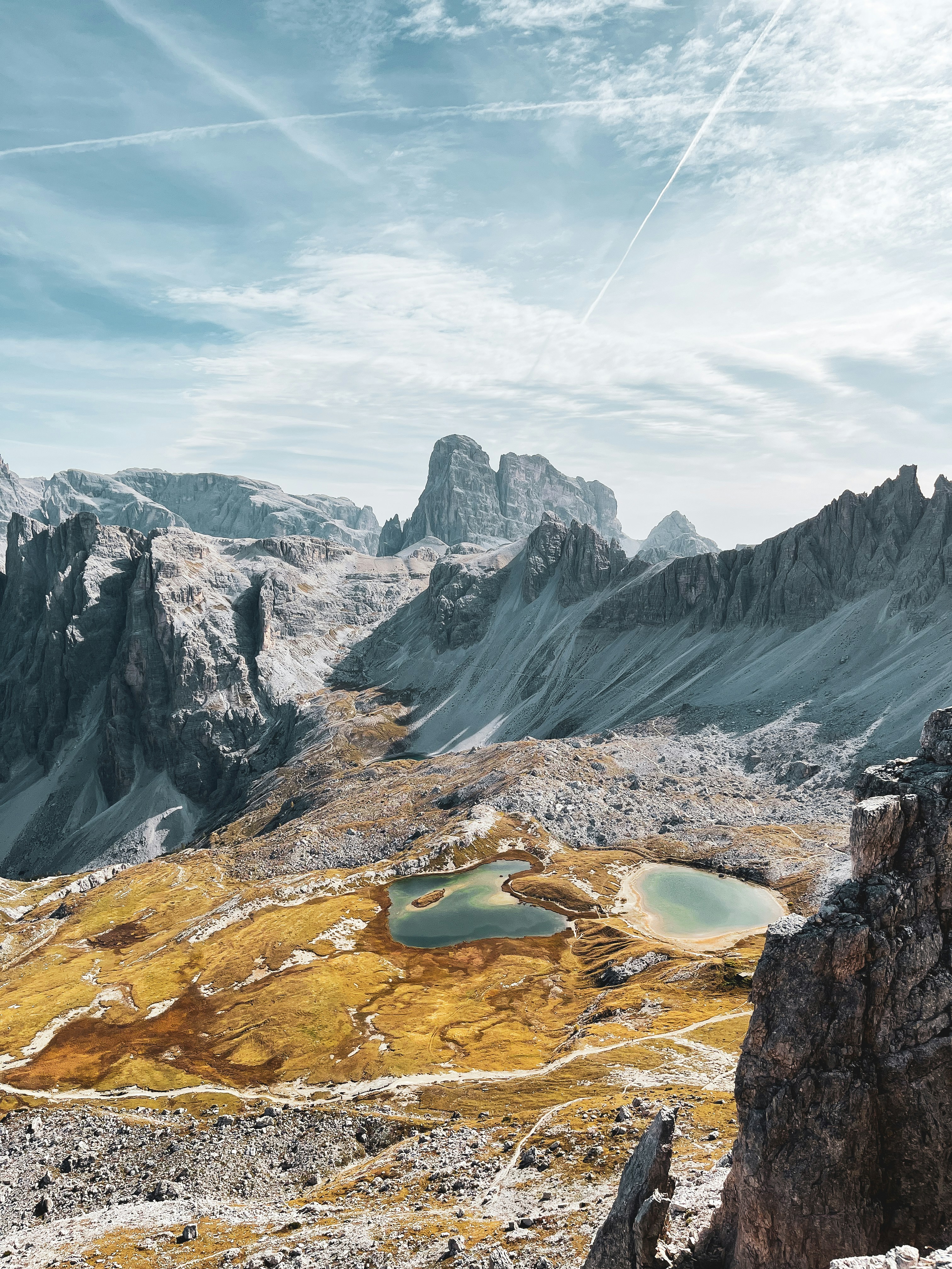 a mountain range with a lake in the middle of it
