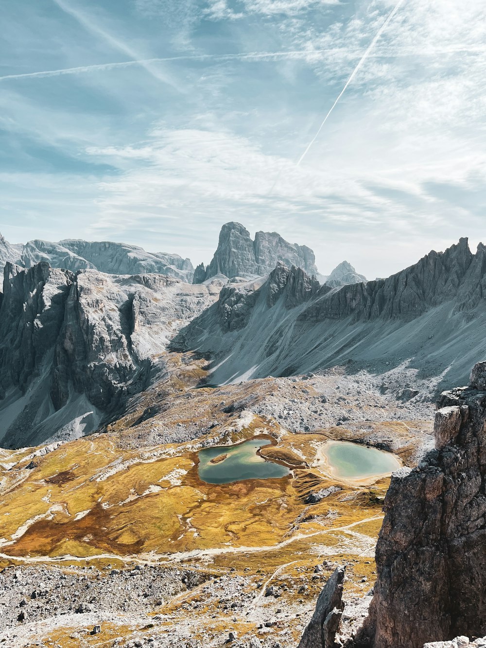 a mountain range with a lake in the middle of it