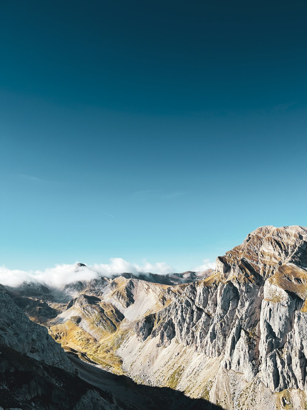 a view of a mountain range from a high point of view