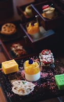 An assortment of colorful cakes and desserts.
