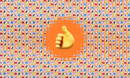 A large yellow thumbs-up emoji is centered against a background filled with small app icons, including popular social media platforms like Facebook, Twitter, Snapchat, TikTok, YouTube, and Instagram. The surrounding area has a predominantly orange color.