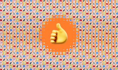 a thumbs up in front of a colorful background