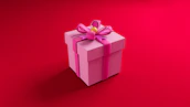 A beautifully arranged gift box featuring bows, tutus, and custom mugs.