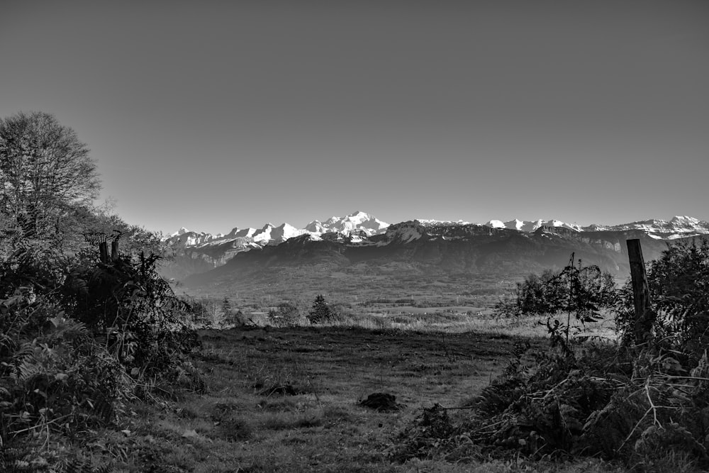 a black and white photo of a mountain range