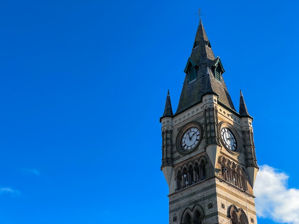 a tall clock tower with a sky background